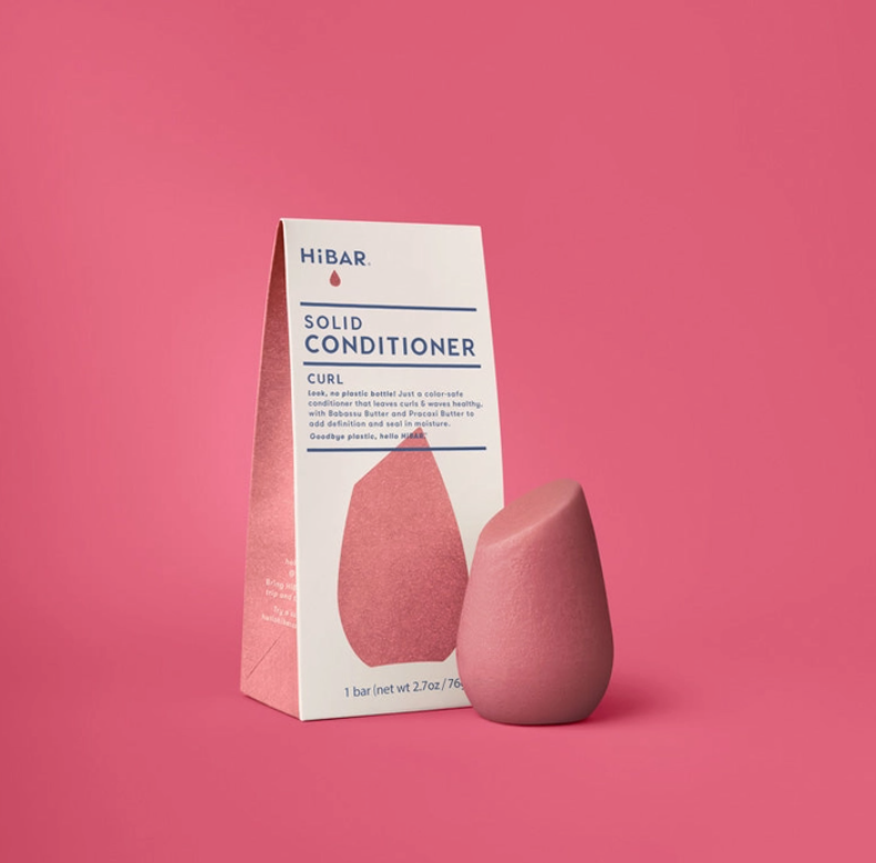 pink conditioner bar in paper box